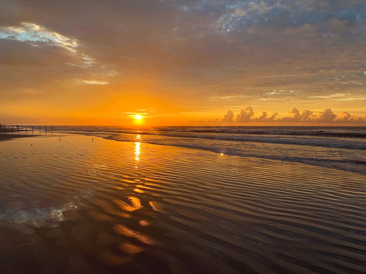 Sunrise over the Gulf from the beach at Sea Isle, Galveston